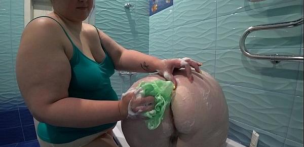  Lesbian washed and fucked a mature bbw in the bathroom. Milf shakes a big soapy booty doggystyle.